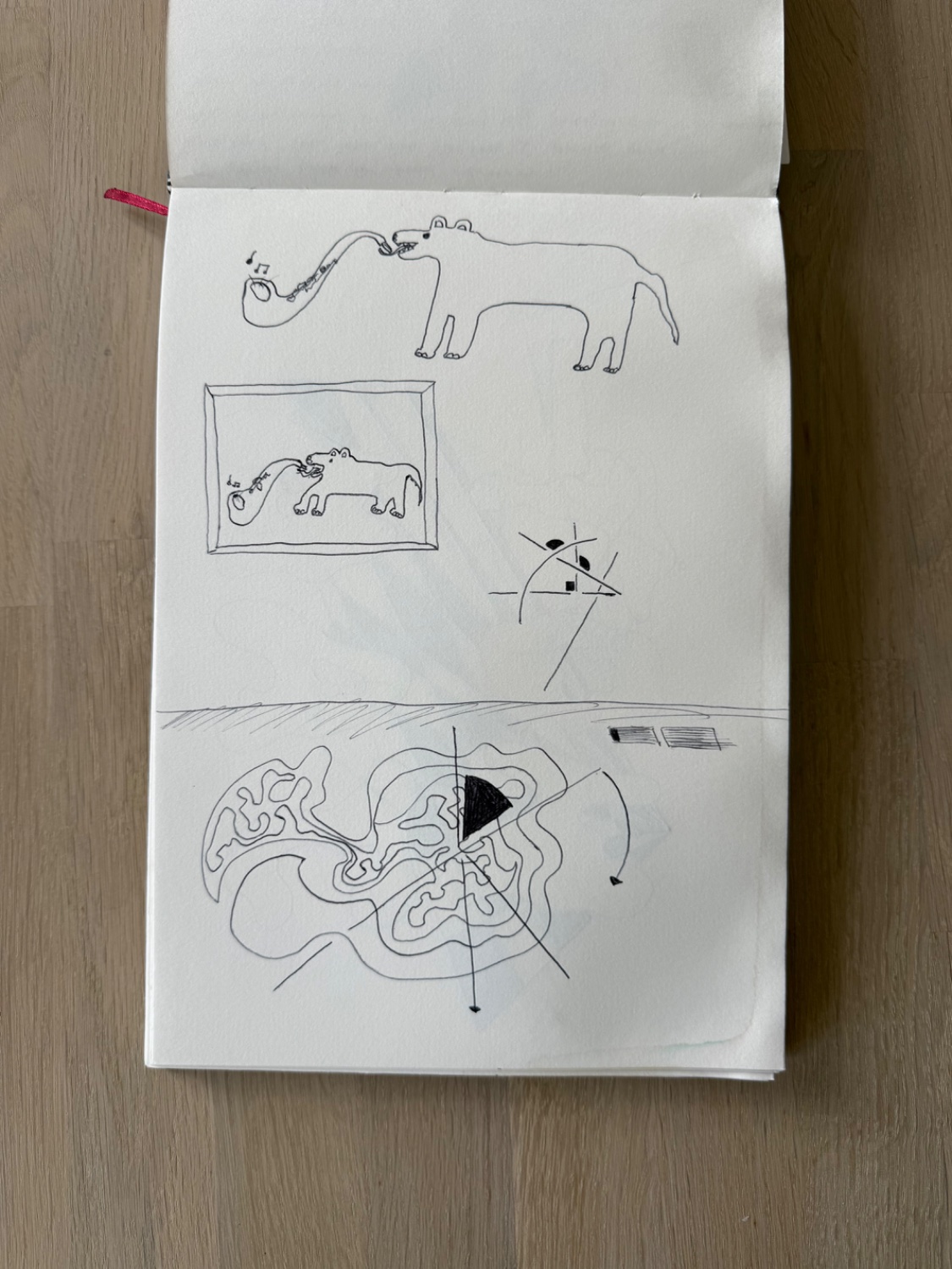 The sketchbook page the dog was drawn on